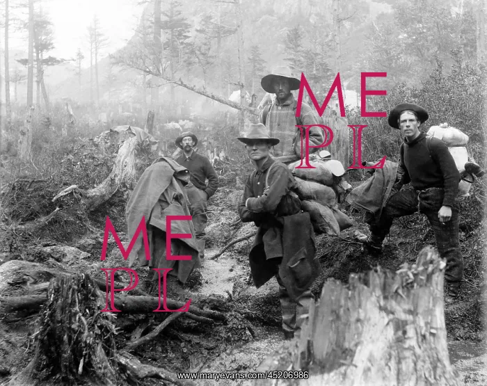 : Four prospectors posed on trail in Alaska ? : Four prospectors posed on trail in Alaska ?