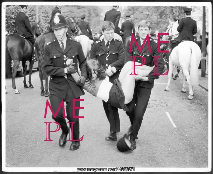 : PROTESTER CARRIED AWAY : PROTESTER CARRIED AWAY