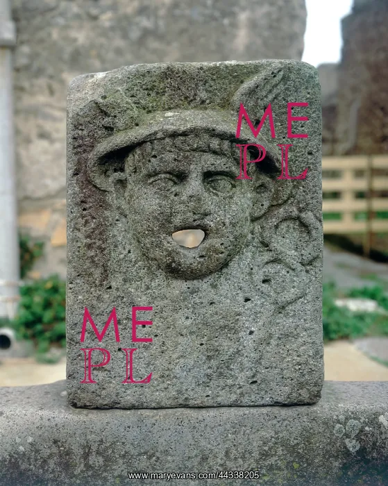 : Public fountain decorated with a : Public fountain decorated with a