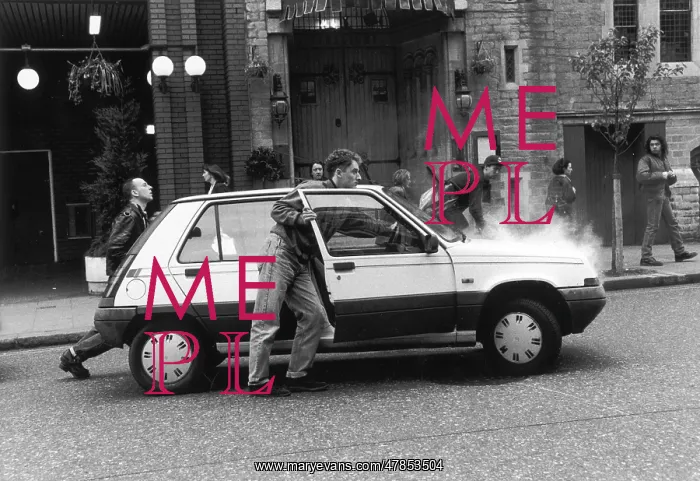 : Pushing a broken-down Renault 5 car : Pushing a broken-down Renault 5 car