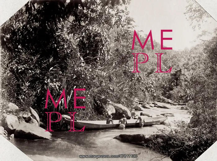 : Pushing a canoe through a river cataract, Madagascar : Pushing a canoe through a river cataract, Madagascar