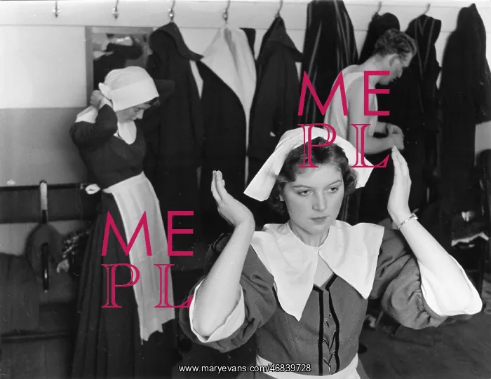 : Putting on costumes for The Crucible : Putting on costumes for The Crucible