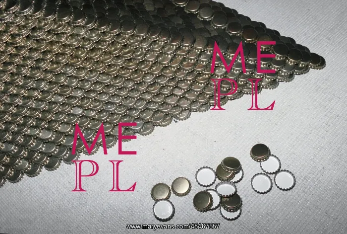 : Pyramid of tin bottle caps : Pyramid of tin bottle caps