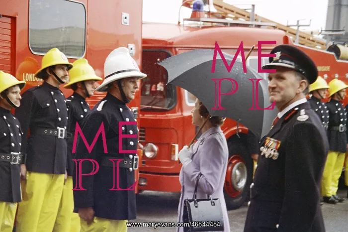 : Queen Elizabeth II inspecting firefighters : Queen Elizabeth II inspecting firefighters