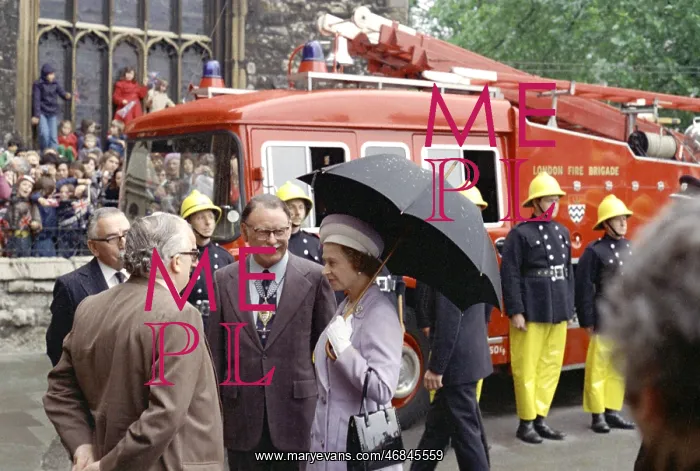 : Queen Elizabeth II inspecting firefighters : Queen Elizabeth II inspecting firefighters