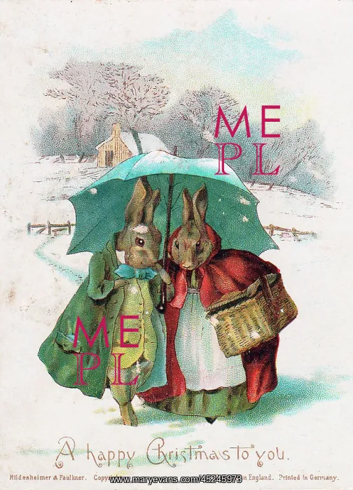 : Two rabbits in the snow on a Christmas card : Two rabbits in the snow on a Christmas card