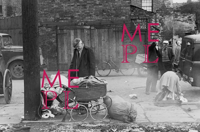 : Rag and bone man with loaded pram : Rag and bone man with loaded pram