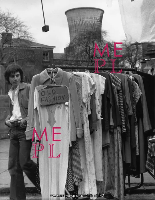: Rail of second-hand clothing in a street : Rail of second-hand clothing in a street