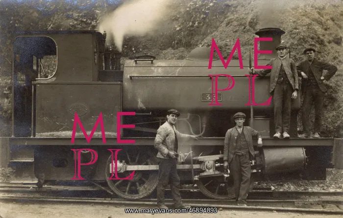 : Railway workers pose with steam engine : Railway workers pose with steam engine