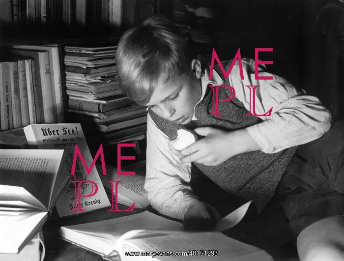 : Reader. A young boy reads a book and eats an apple : Reader. A young boy reads a book and eats an apple