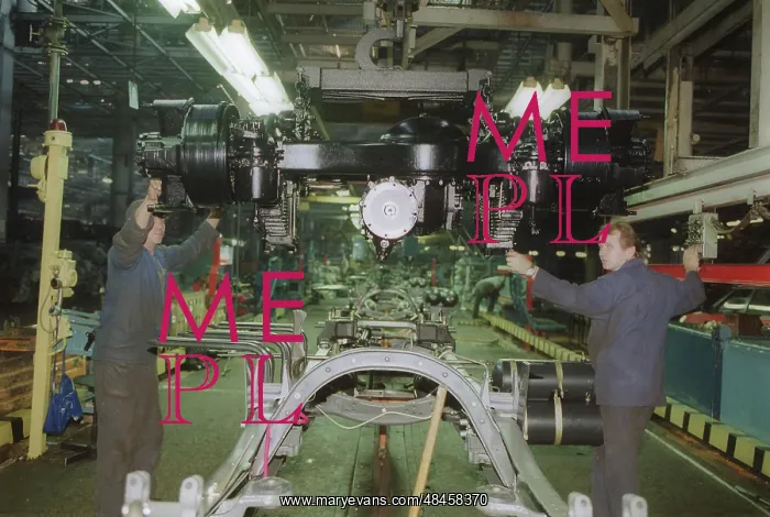 : Rear axle being installed at KamAZ factory main : Rear axle being installed at KamAZ factory main