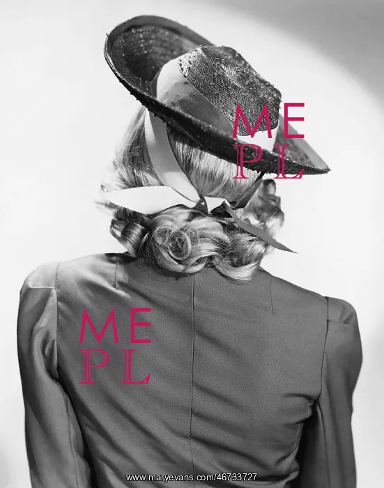 : Rear view of a woman wearing a hat : Rear view of a woman wearing a hat