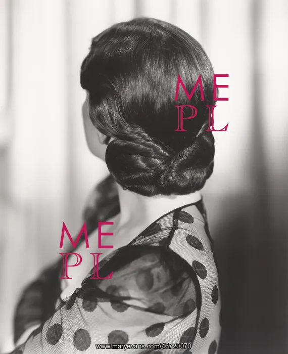 : Rear view of woman's 1940s hairstyle : Rear view of woman's 1940s hairstyle