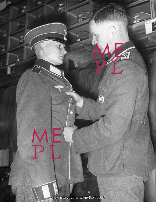 : Recruit is being dressed up, 1938 : Recruit is being dressed up, 1938