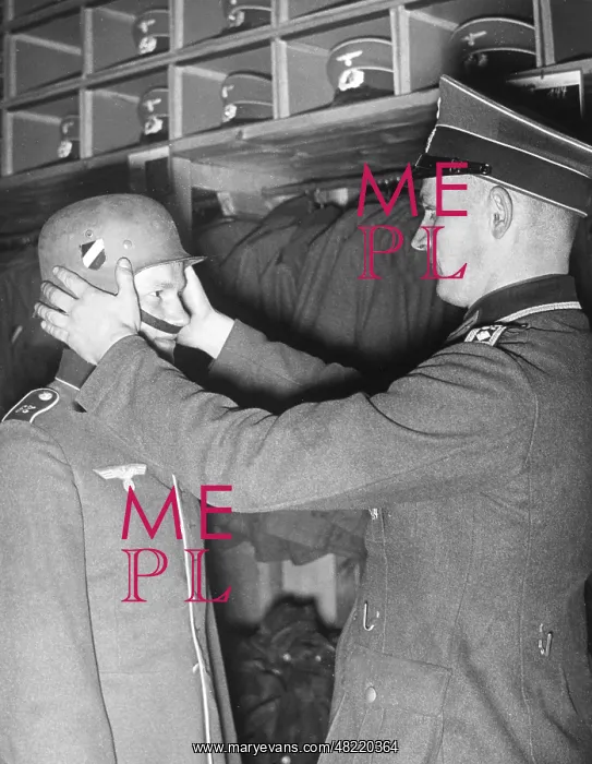  : A recruit receives his uniform, 1938