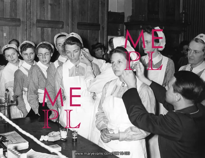 : Red Cross nurses during a blood test, 1940 : Red Cross nurses during a blood test, 1940