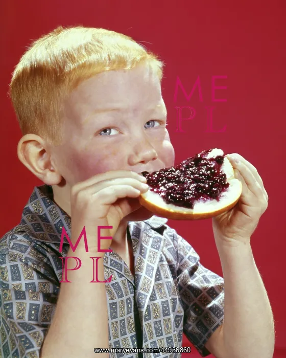 : Red Haired Boy Eating Slice of Bread with Gobs : Red Haired Boy Eating Slice of Bread with Gobs
