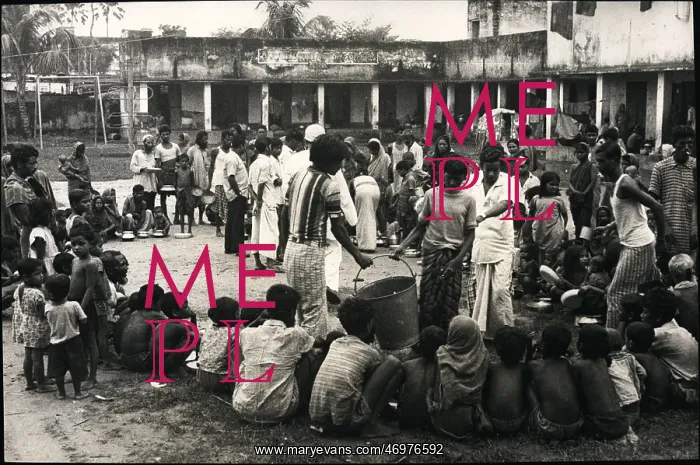 : Refugees. Mar. 27 Bangladesh Flood. Refugees at Azimpur wait in a hungry : Refugees. Mar. 27 Bangladesh Flood. Refugees at Azimpur wait in a hungry