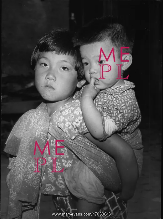 : Refugees. Doubtful Future: Two pensive Quemoy children rendered orphan : Refugees. Doubtful Future: Two pensive Quemoy children rendered orphan