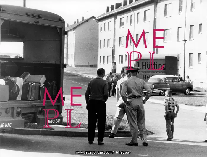 : Relatives of US Army leaving decrepit apartments : Relatives of US Army leaving decrepit apartments