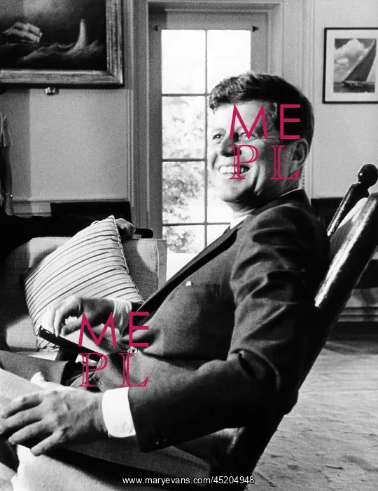 : A relaxed President Kennedy sits in his ? : A relaxed President Kennedy sits in his ?