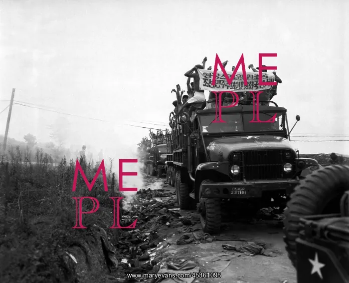 : Released Communist POWs in trucks ripped off their : Released Communist POWs in trucks ripped off their