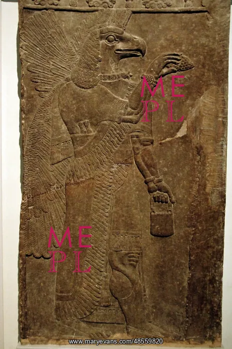 : Relief depicting a eagle-headed protective spirit. Nimrud : Relief depicting a eagle-headed protective spirit. Nimrud