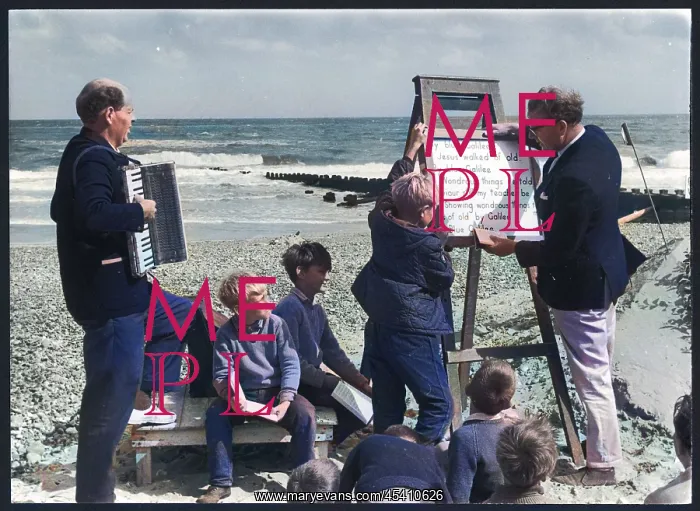 : Religious service being held on a beach : Religious service being held on a beach