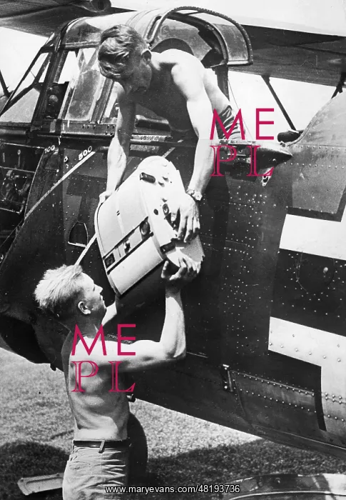 : Removal of a camera from a German reconnaissance plane, 1941 : Removal of a camera from a German reconnaissance plane, 1941