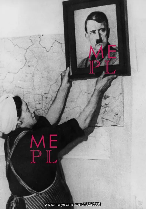 : Removal of a Hitler portrait, 1945 : Removal of a Hitler portrait, 1945