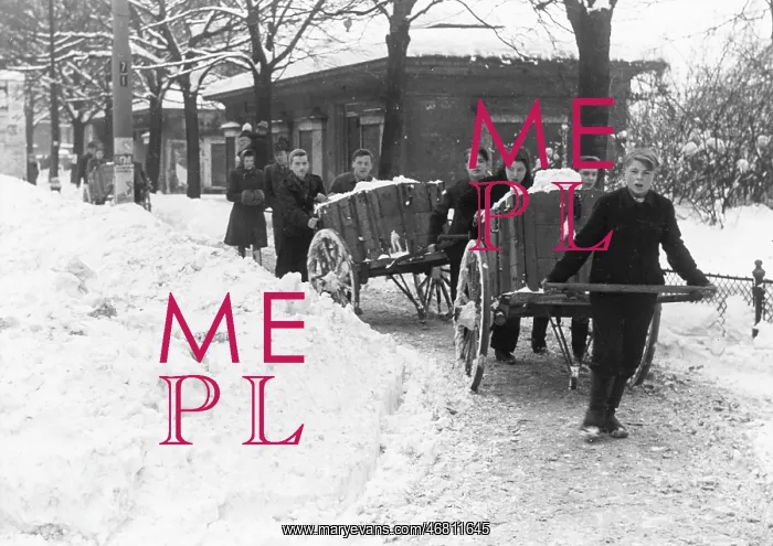 : Removal of snow by young people with carts : Removal of snow by young people with carts