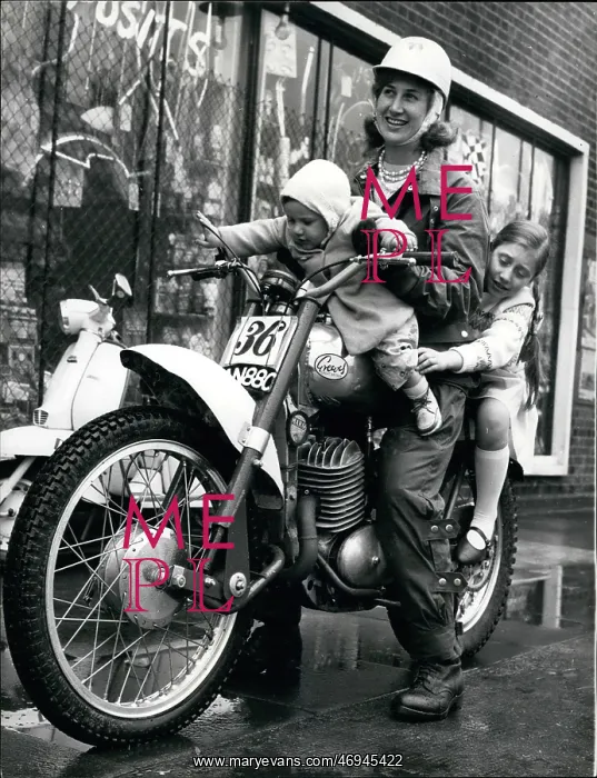 : Rene Bennett on motorcycle with her two children : Rene Bennett on motorcycle with her two children
