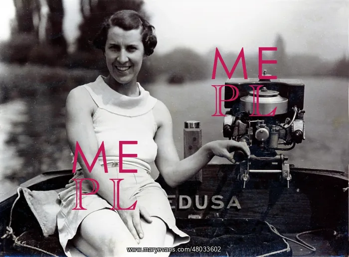 : Rene Fraser at the helm of the tender to Medusa : Rene Fraser at the helm of the tender to Medusa
