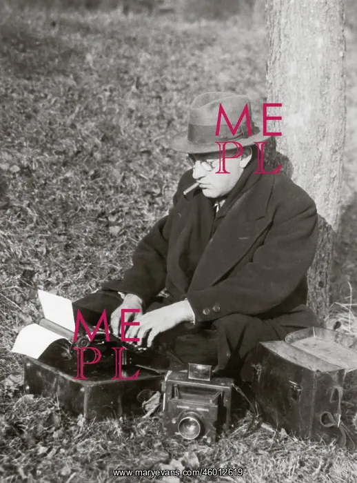 : Reporter with a portable typewriter : Reporter with a portable typewriter