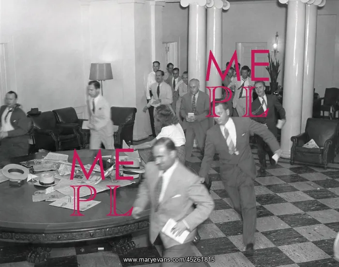  : Reporters running through the White House after