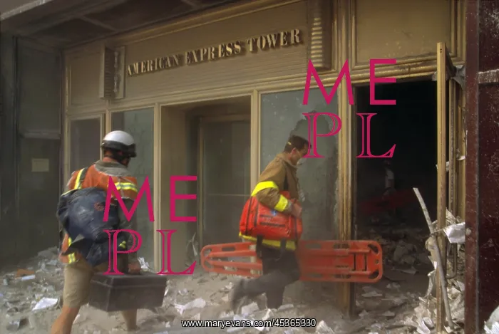 : Rescue workers enter the American Express Tower : Rescue workers enter the American Express Tower
