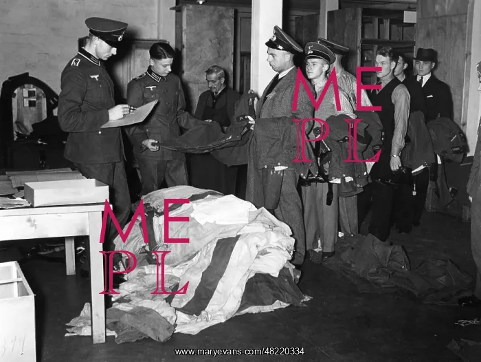 : Reservists give in their uniforms in the wardrobe, 1938 : Reservists give in their uniforms in the wardrobe, 1938