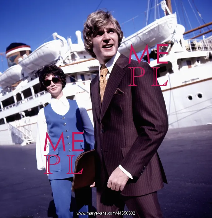  : Retro British couple modelling suits