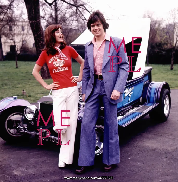  : Retro couple with custom made car 1970s