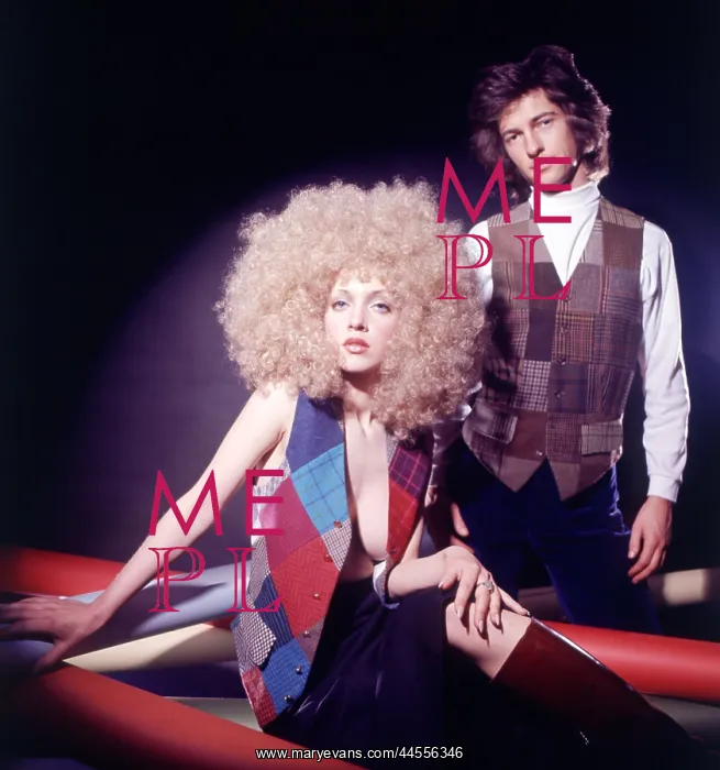 : Retro couple posing in matching outfits : Retro couple posing in matching outfits