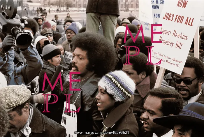 : Reverend Jesse Jackson surrounded by marchers : Reverend Jesse Jackson surrounded by marchers