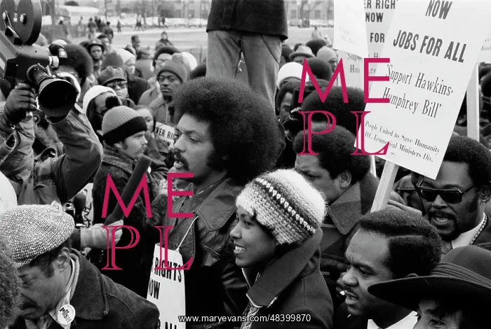: Reverend Jesse Jackson surrounded by marchers : Reverend Jesse Jackson surrounded by marchers