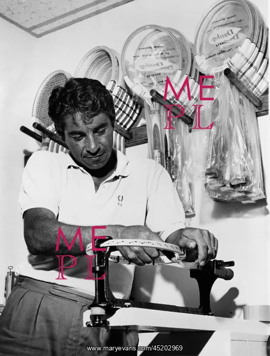 : Richard Pancho Gonzales restringing a ? : Richard Pancho Gonzales restringing a ?
