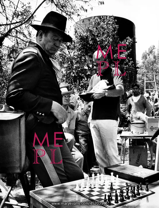 : RIO LOBO, John Wayne (far left), on set, ? : RIO LOBO, John Wayne (far left), on set, ?