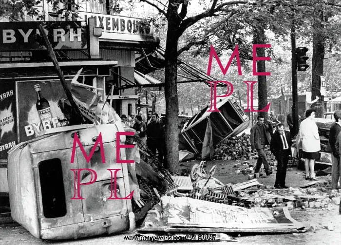 : RIOTS-Parisians inspect overturned auto ? : RIOTS-Parisians inspect overturned auto ?