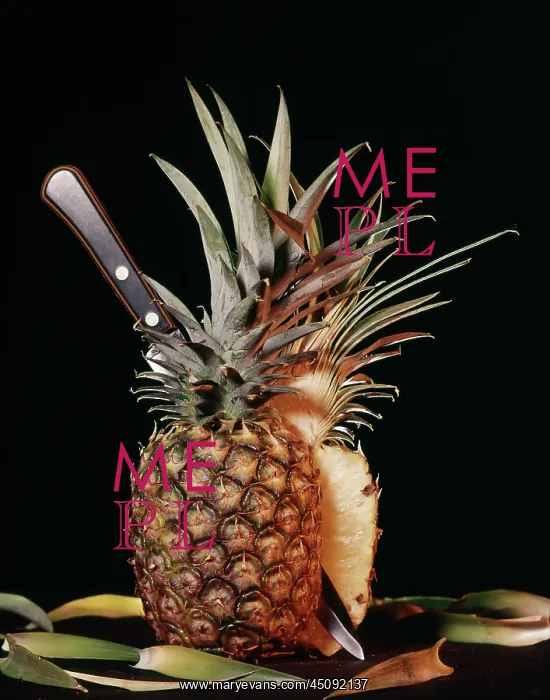 : Whole Ripe Pineapple Cut in Half with Knife : Whole Ripe Pineapple Cut in Half with Knife
