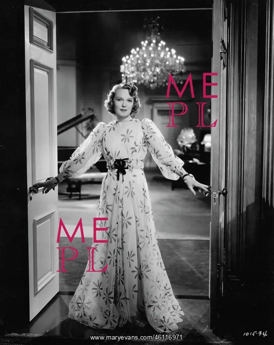 : Rita Johnson wearing an evening gown designed by Dolly Tree : Rita Johnson wearing an evening gown designed by Dolly Tree