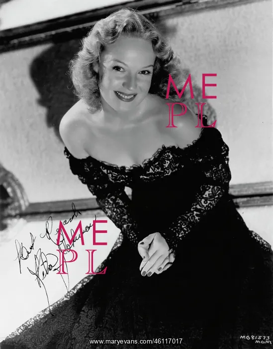 : Rita Johnson wearing an evening gown designed by Dolly Tree : Rita Johnson wearing an evening gown designed by Dolly Tree
