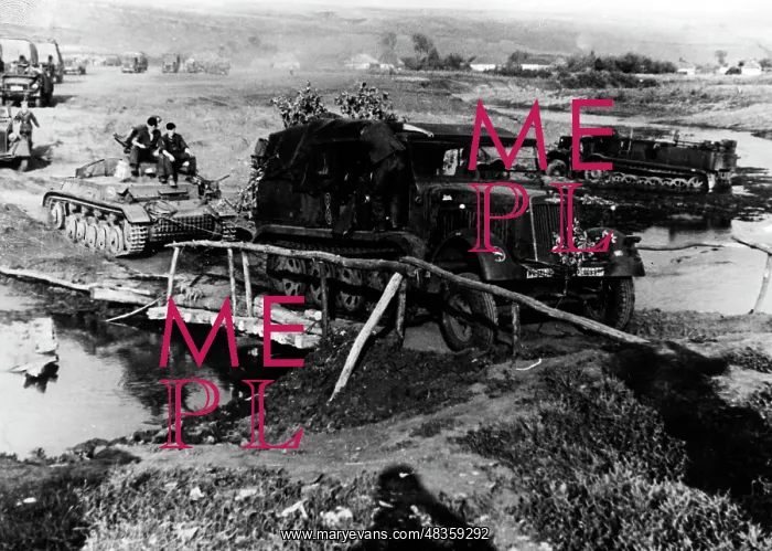 : River crossing over a makeshift bridge, 1942 : River crossing over a makeshift bridge, 1942