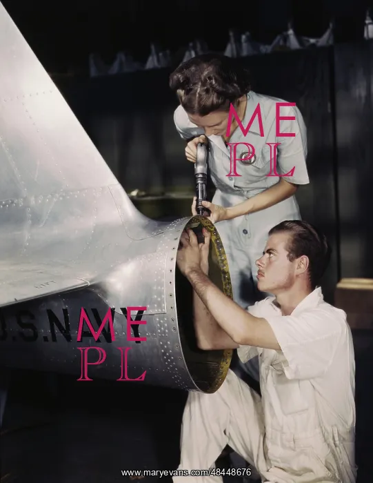 : A riveter supervises a NYA trainee at a U.S : A riveter supervises a NYA trainee at a U.S